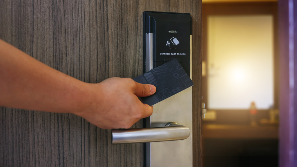 Locksmith syncing a smart lock with a smartphone app